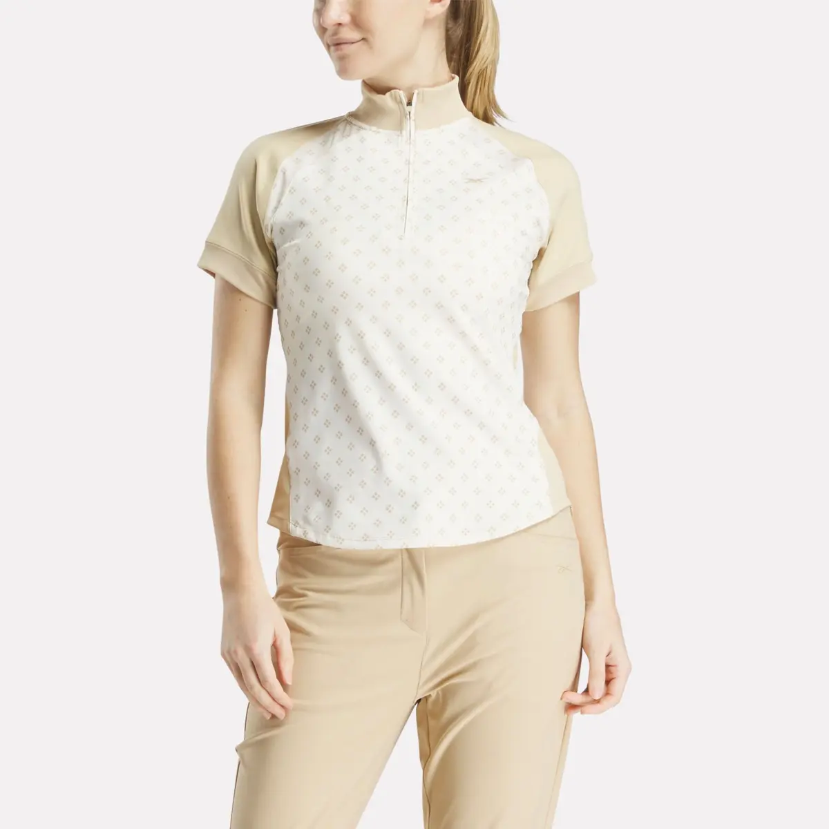 Damen-Kurzarm-Shirt mit 1/4-Reißverschluss und Mini-Argyle-Print