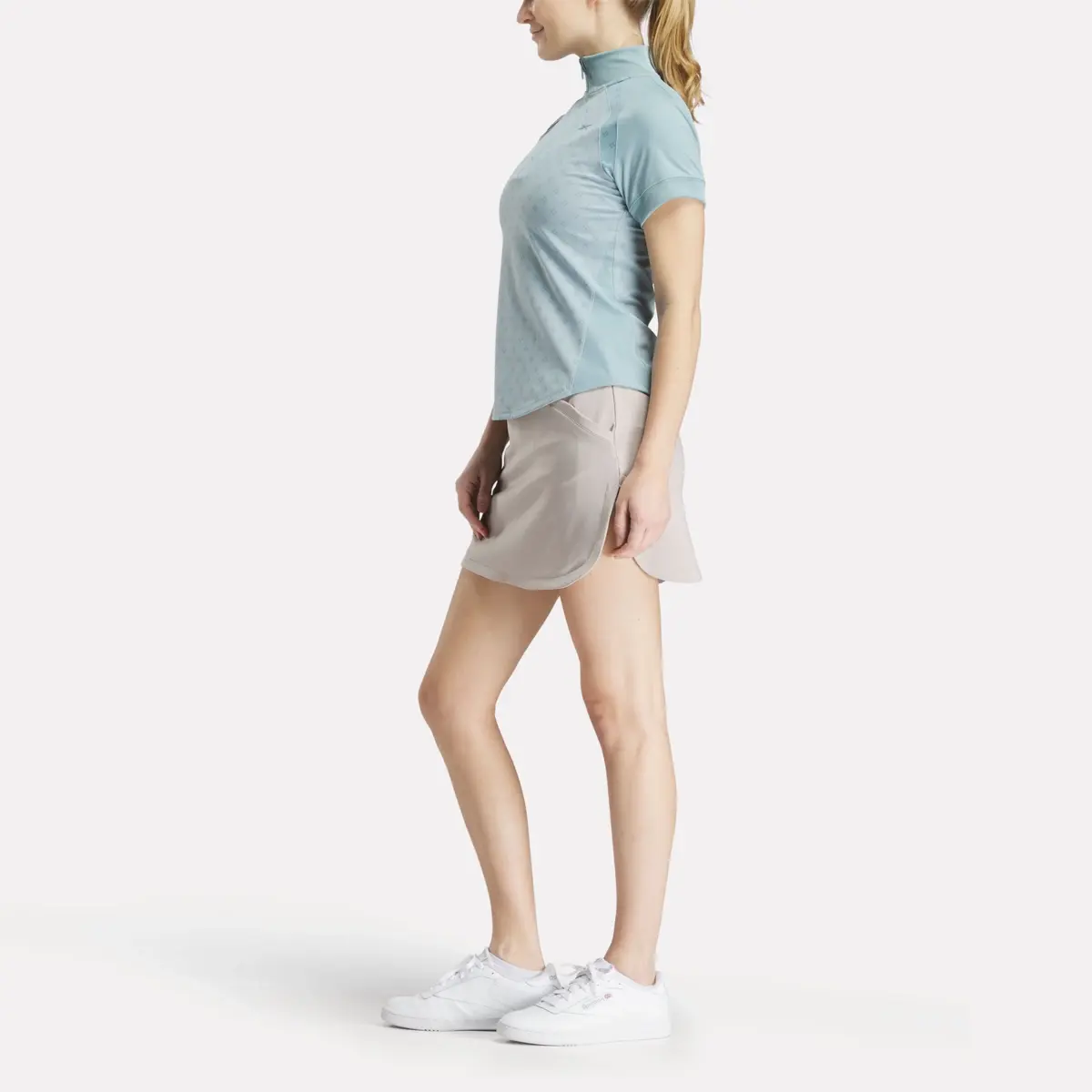 Damen-Kurzarm-Shirt mit 1/4-Reißverschluss und Mini-Argyle-Print